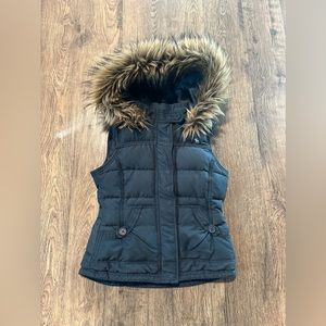 Women's size extra large, Abercrombie, fur-hooded, zip & button up vest